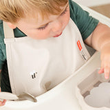 Pull-over bib | Tiny farm - Sand