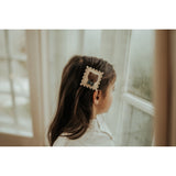 Donsje Guar Clip Stamp Cream Scored Leather