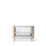 Wood Mini+ cot bed incl. junior kit, 68x122/162 cm, white/oak