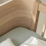Wood Mini+ cot bed excl. junior kit, 68x122 cm, oak - new