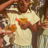 t'shirt - light yellow w/ "beach bar" print