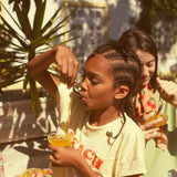 t'shirt - light yellow w/ "beach bar" print