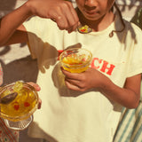 t'shirt - light yellow w/ "beach bar" print
