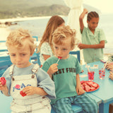 dungarees - washed light blue denim w/ "peace" print