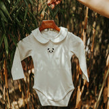 Davo Bodysuit - Panda - Off White van Donsje Amsterdam | Kids Conceptstore Le Fanfare