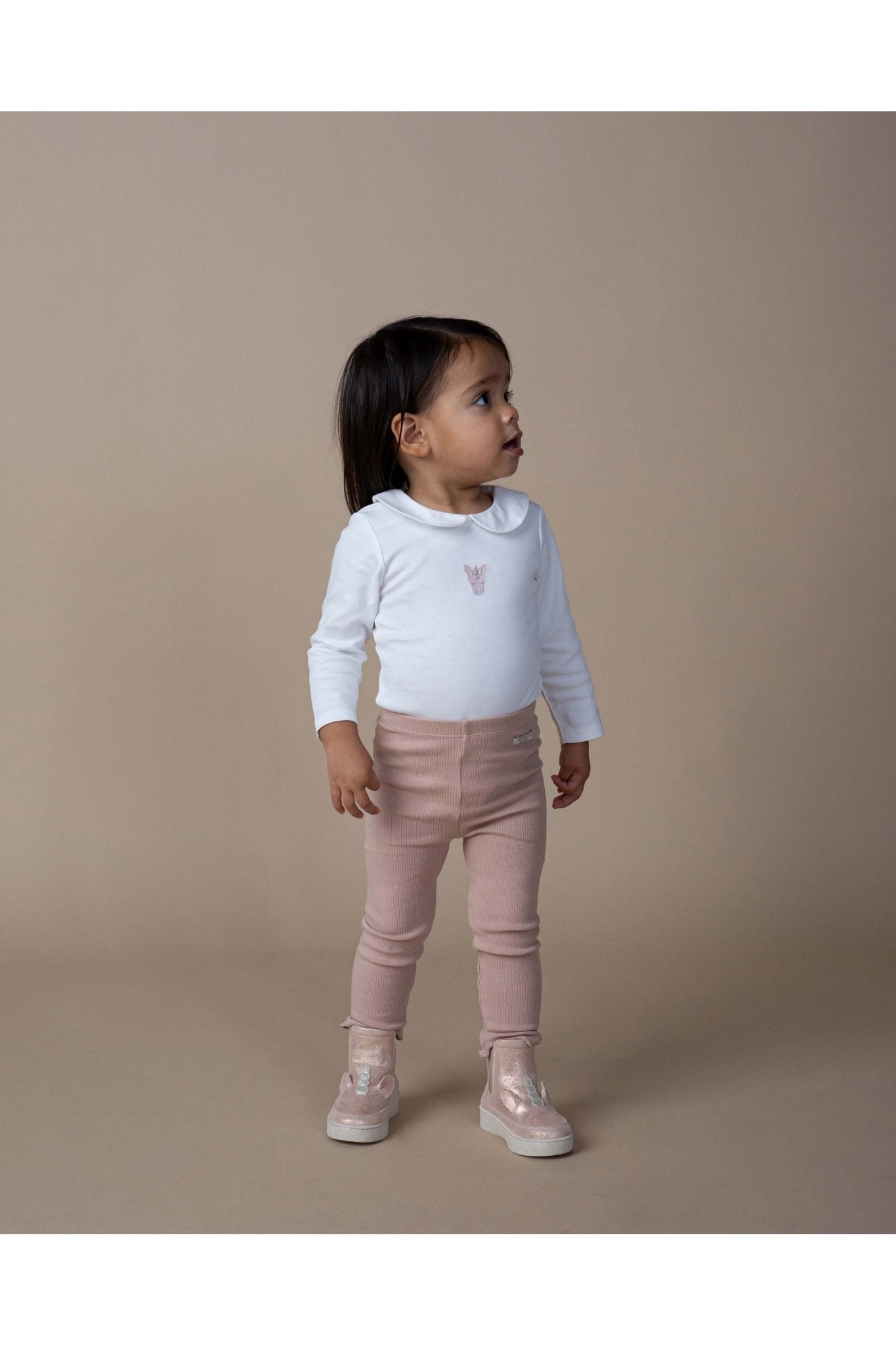 Davo Bodysuit - Unicorn - Off White van Donsje Amsterdam | Kids Conceptstore Le Fanfare