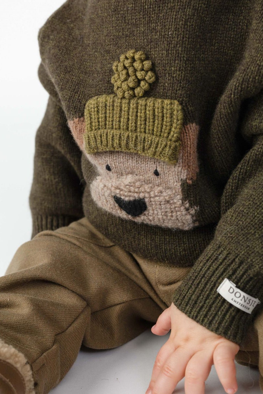Denn Merino Wool Sweater | Terrier - Dark Olive van Donsje Amsterdam | Kids Conceptstore Le Fanfare