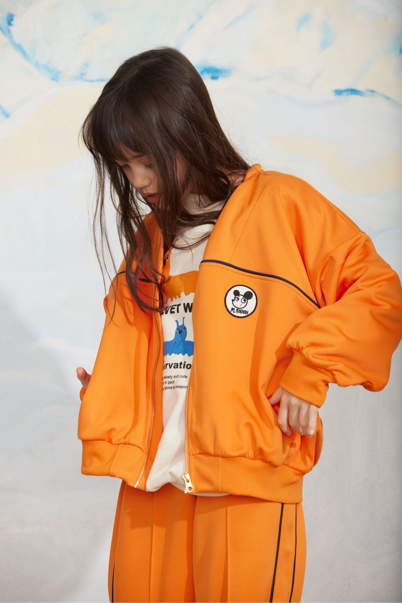 Ritzratz patch tracksuit jacket - Orange van Mini Rodini | Kids Conceptstore Le Fanfare