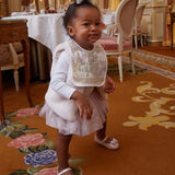 Satin bib - Carousel Pink van Atelier Choux | Kids Conceptstore Le Fanfare