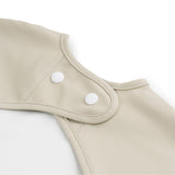 Sleeved pocket bib | Lalee - Sand van Done by Deer | Kids Conceptstore Le Fanfare