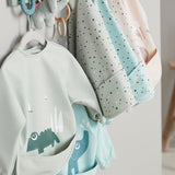Sleeved pocket bib | Ozzo - Powder van Done by Deer | Kids Conceptstore Le Fanfare
