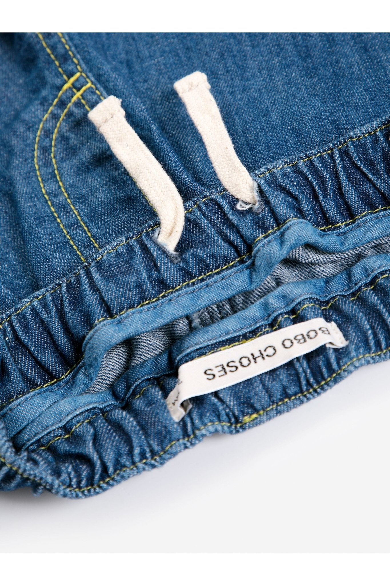 Taxi Saurus Tag denim pants BB - Midnight Blue van Bobo Choses | Kids Conceptstore Le Fanfare