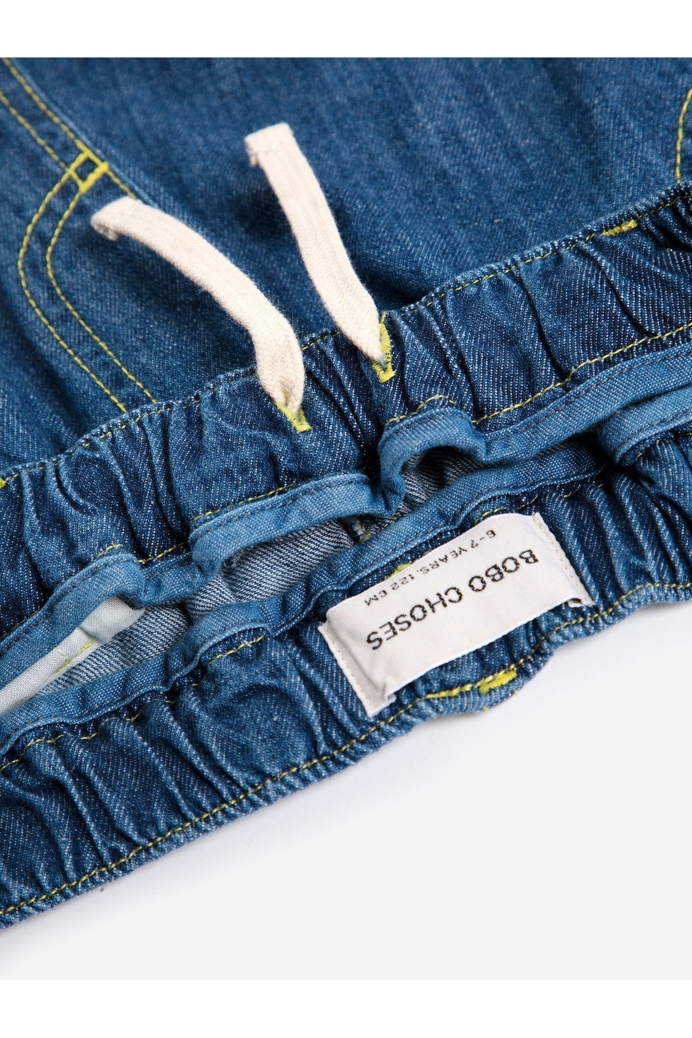 Taxi Saurus Tag denim pants - Midnight Blue van Bobo Choses | Kids Conceptstore Le Fanfare