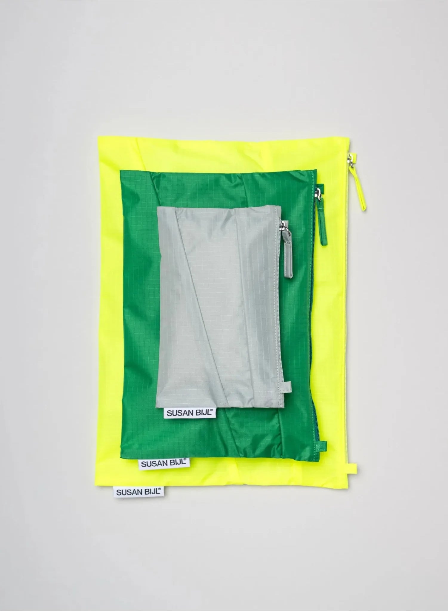 The New Pouch Fluo Yellow Large van SUSAN BIJL | Kids Conceptstore Le Fanfare