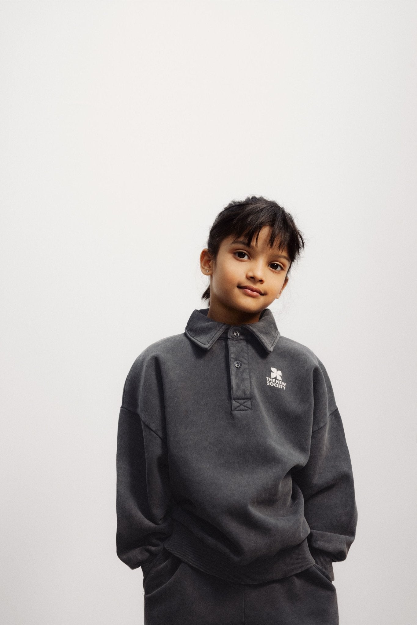TNS Logo Polo van The New Society | Kids Conceptstore Le Fanfare