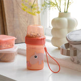 To go 2-way snack container L Ozzo Papaya van Done by Deer | Kids Conceptstore Le Fanfare