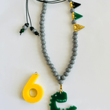 Verjaardagsketting Geel van ByMelo | Kids Conceptstore Le Fanfare
