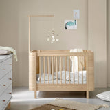 Wood Mini+ cot bed excl. junior kit, 68x122 cm, oak - new van Oliver Furniture | Kids Conceptstore Le Fanfare