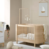 Wood Mini+ cot bed excl. junior kit, 68x122 cm, oak - new van Oliver Furniture | Kids Conceptstore Le Fanfare