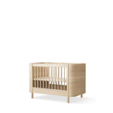 Wood Mini+ cot bed excl. junior kit, 68x122 cm, oak - new van Oliver Furniture | Kids Conceptstore Le Fanfare