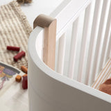 Wood Mini+ cot bed excl. junior kit, 68x122 cm, white/oak van Oliver Furniture | Kids Conceptstore Le Fanfare