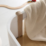 Wood Mini+ cot bed excl. junior kit, 68x122 cm, white/oak van Oliver Furniture | Kids Conceptstore Le Fanfare