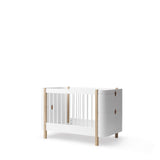 Wood Mini+ cot bed excl. junior kit, 68x122 cm, white/oak van Oliver Furniture | Kids Conceptstore Le Fanfare