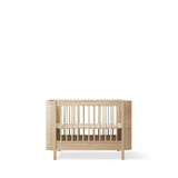 Wood Mini+ cot bed incl. junior kit, 68x122/162 cm, oak - new van Oliver Furniture | Kids Conceptstore Le Fanfare