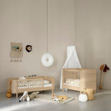 Wood Mini+ cot bed incl. junior kit, 68x122/162 cm, oak - new van Oliver Furniture | Kids Conceptstore Le Fanfare