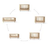 Wood Mini+ cot bed incl. junior kit, 68x122/162 cm, oak - new van Oliver Furniture | Kids Conceptstore Le Fanfare