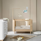 Wood Mini+ cot bed incl. junior kit, 68x122/162 cm, oak - new van Oliver Furniture | Kids Conceptstore Le Fanfare