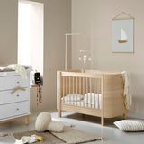Wood Mini+ cot bed incl. junior kit, 68x122/162 cm, oak - new van Oliver Furniture | Kids Conceptstore Le Fanfare