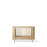 Wood Mini+ cot bed incl. junior kit, 68x122/162 cm, oak - new van Oliver Furniture | Kids Conceptstore Le Fanfare